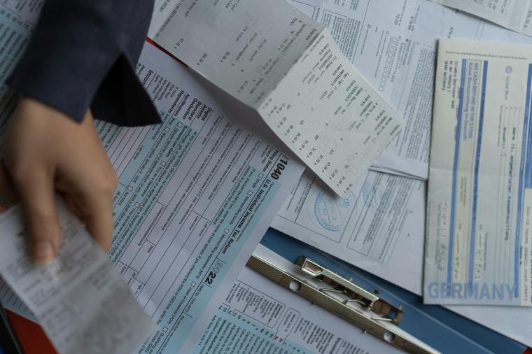 tax forms and pen
