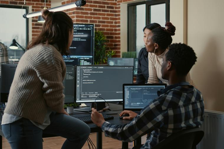team working at computers