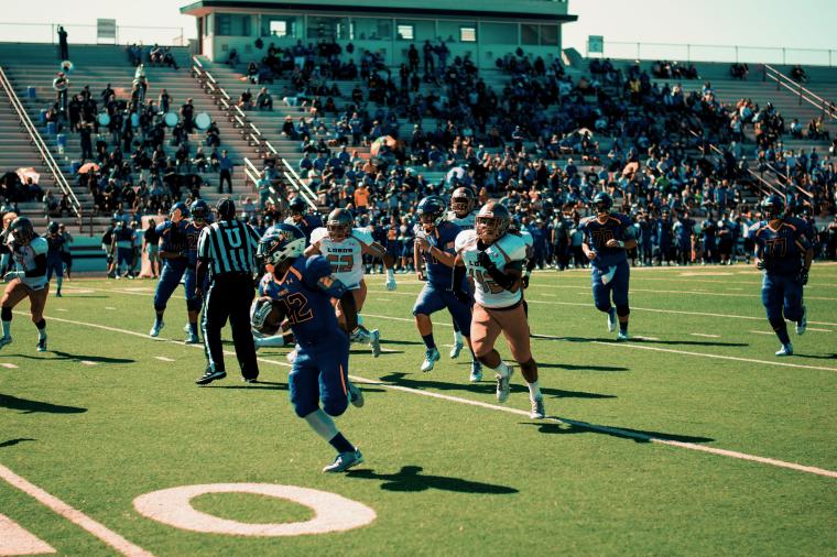 high school football game late summer