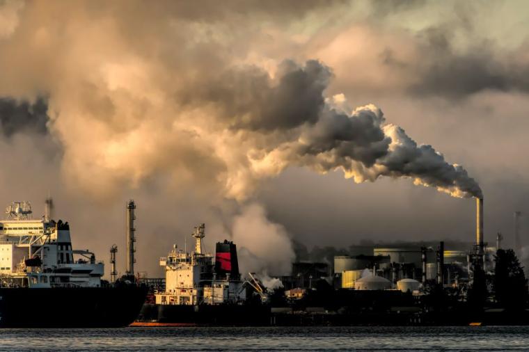 Factories emitting smoke into atmosphere.